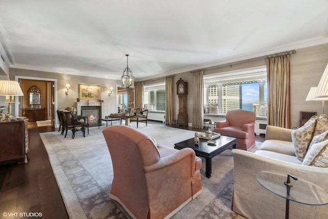 living room featuring crown molding and hardwood / wood-style floors