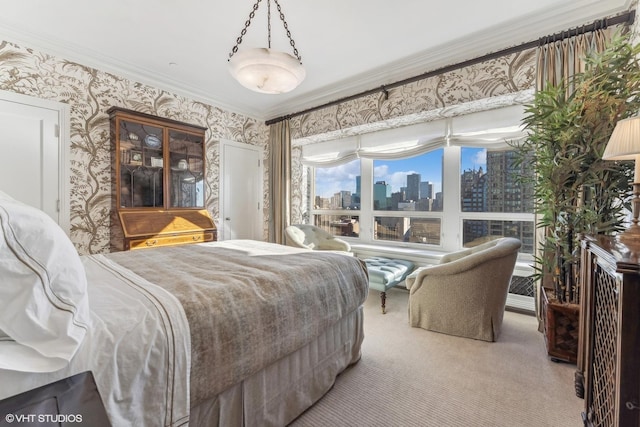 bedroom featuring crown molding and carpet