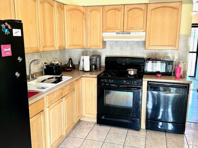 kitchen with black appliances, light brown cabinetry, light tile patterned floors, tasteful backsplash, and sink