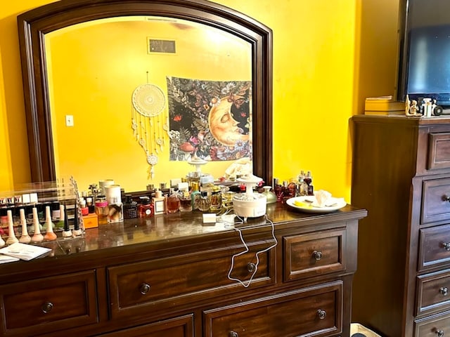 bar featuring dark brown cabinetry