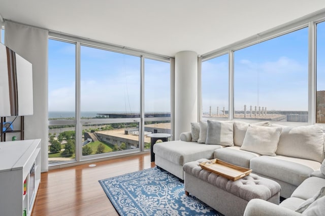 sunroom / solarium with a city view and a healthy amount of sunlight