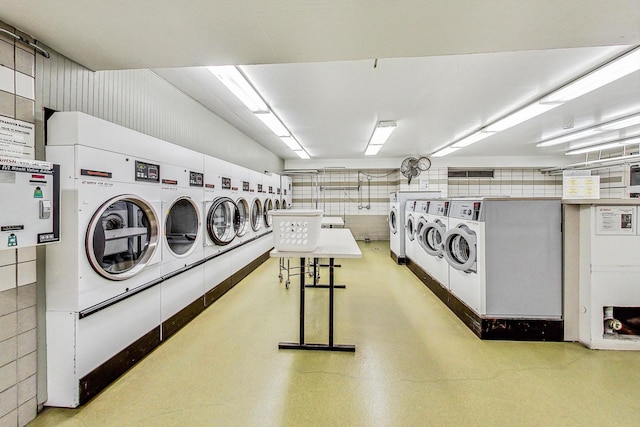 laundry room with independent washer and dryer