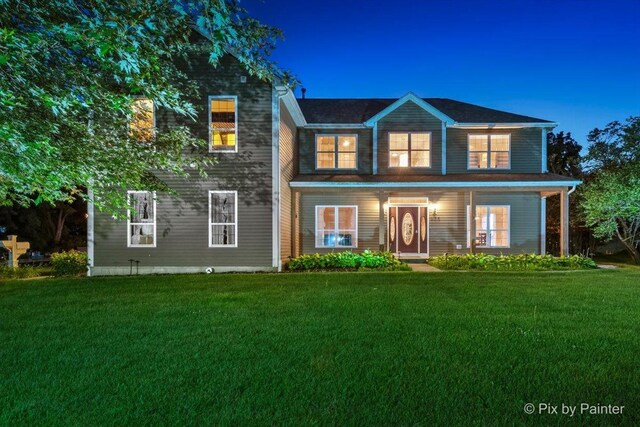 view of front of house featuring a yard