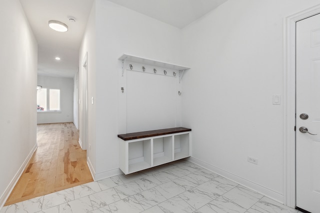 mudroom with light wood-type flooring