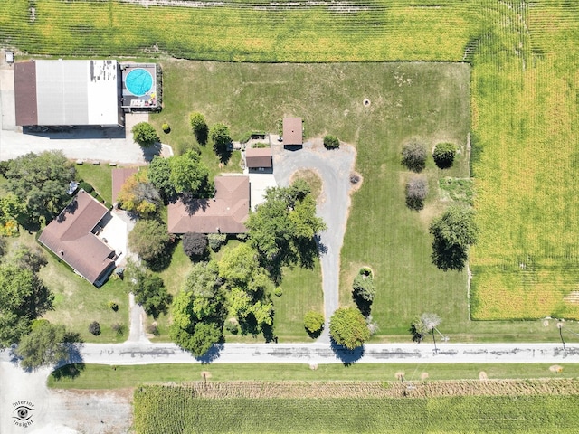 birds eye view of property featuring a rural view