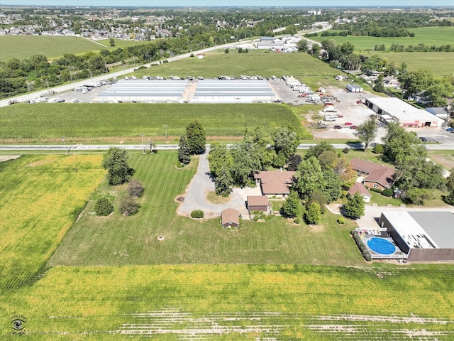 birds eye view of property featuring a rural view