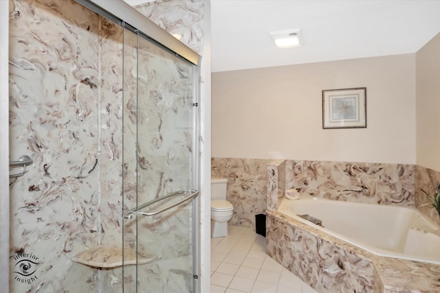 bathroom featuring tile patterned flooring, toilet, and plus walk in shower