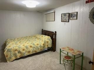 bedroom with light carpet