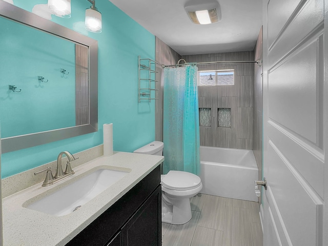 full bathroom with vanity, toilet, and shower / bath combination with curtain