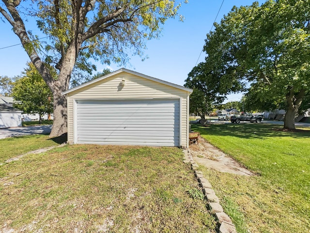 garage with a yard