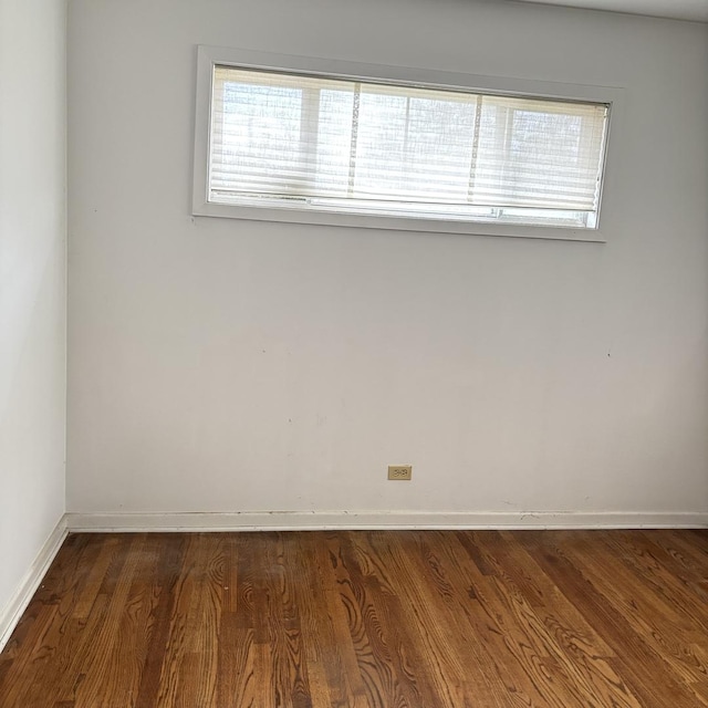 137 Julie Dr, Glenview, IL 60025 - unfurnished room with healthy amount of natural light, wood finished floors, and baseboards