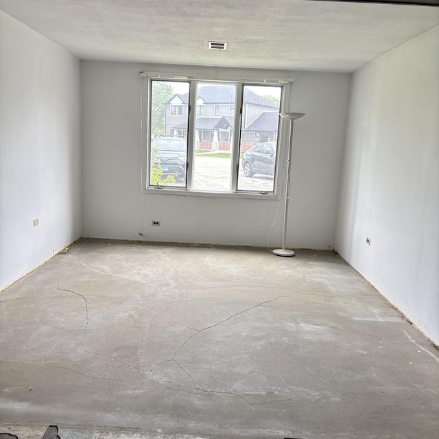 137 Julie Dr, Glenview, IL 60025 - spare room featuring unfinished concrete flooring