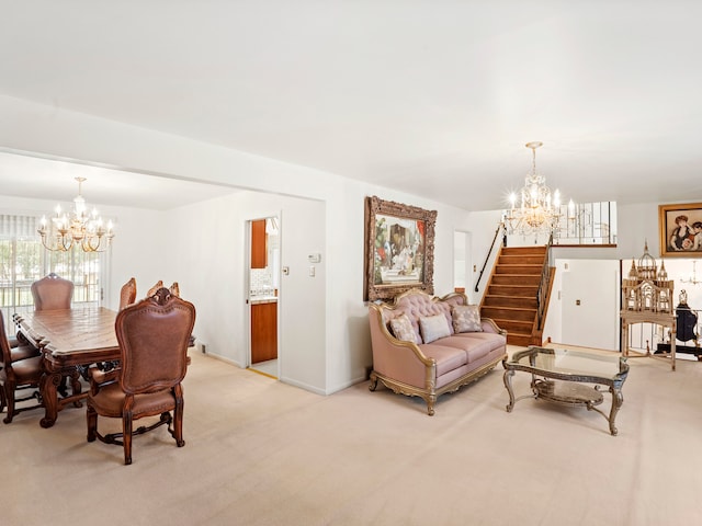 dining area featuring a chandelier and light colored carpet