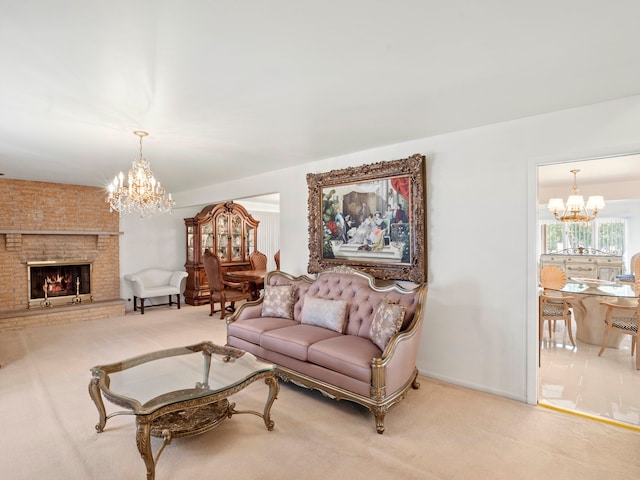 carpeted living room featuring a brick fireplace and a chandelier