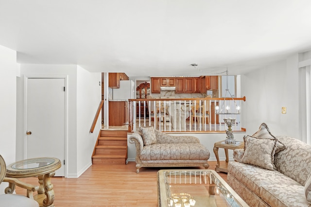 living room with light hardwood / wood-style flooring