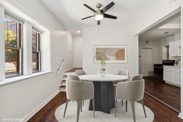 dining room featuring hardwood / wood-style floors and ceiling fan