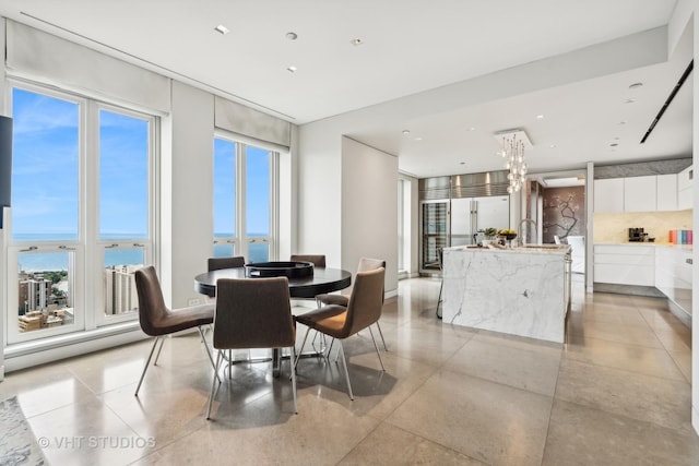 dining space with a water view