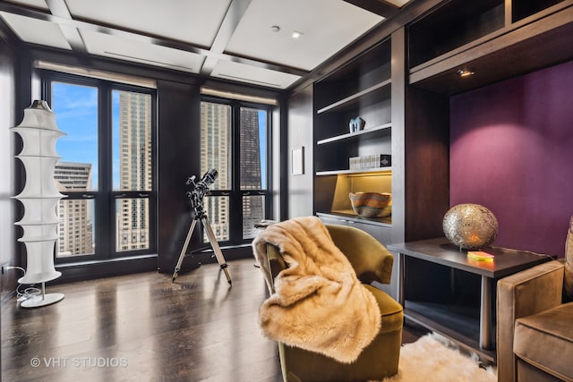 interior space with coffered ceiling and wood-type flooring