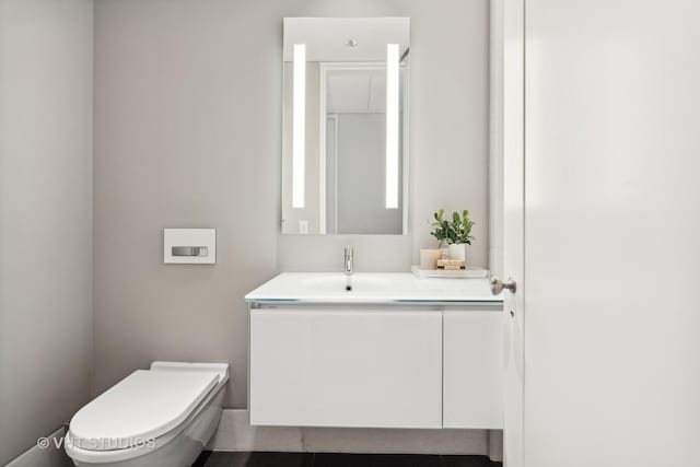 half bath with toilet and vanity