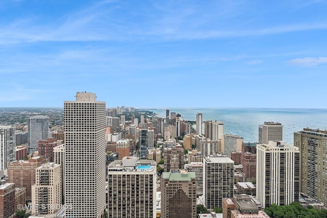 property's view of city featuring a water view