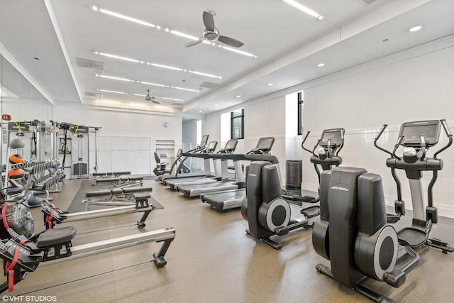 gym with a ceiling fan, recessed lighting, and visible vents