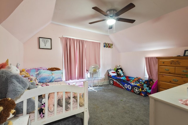 carpeted bedroom with ceiling fan and lofted ceiling