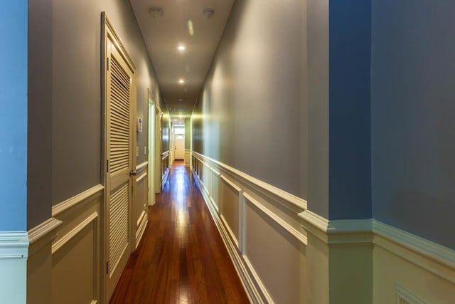 hall with dark hardwood / wood-style floors