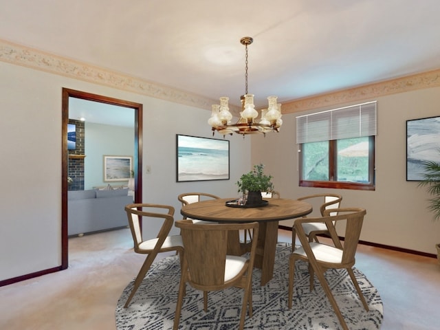 carpeted dining room featuring an inviting chandelier