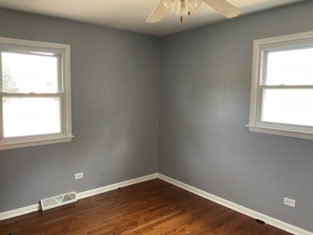 unfurnished room featuring ceiling fan and hardwood / wood-style flooring