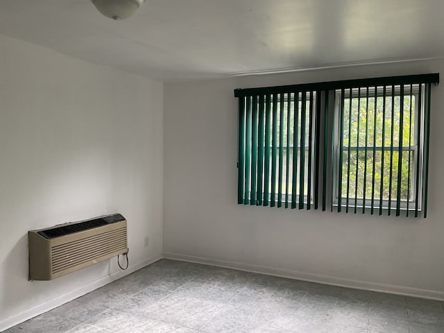 empty room featuring light tile patterned floors