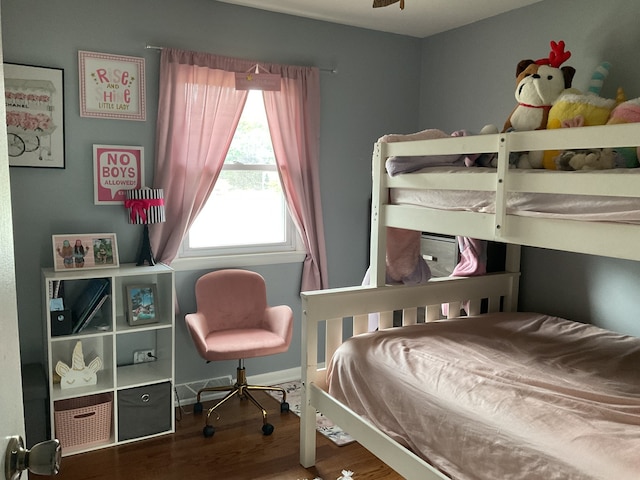 bedroom featuring wood-type flooring