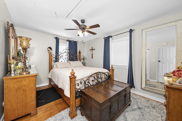 bedroom featuring ceiling fan and light hardwood / wood-style floors