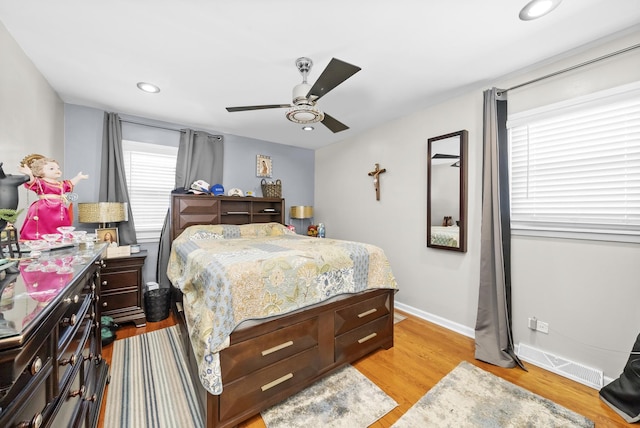 bedroom featuring ceiling fan and light wood-type flooring