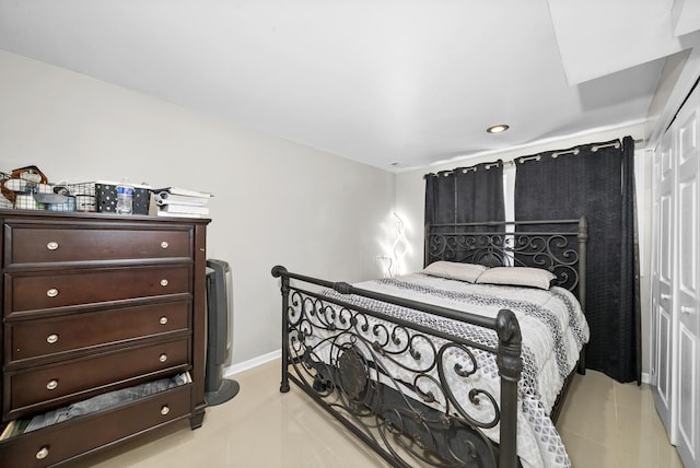 bedroom featuring light tile patterned flooring