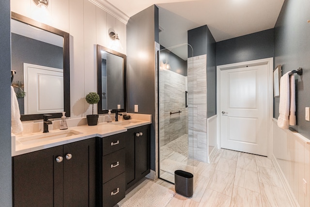 bathroom featuring double vanity, a shower with door, and tile patterned flooring