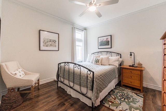 bedroom featuring ceiling fan, dark hardwood / wood-style flooring, and crown molding