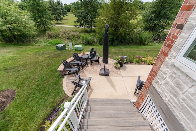 exterior space with a patio and a yard