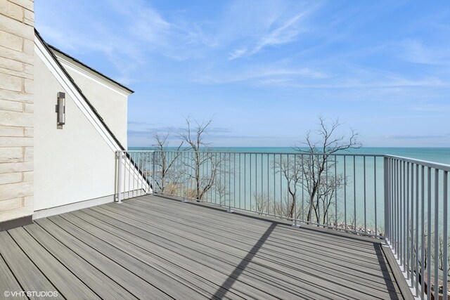 deck featuring a water view