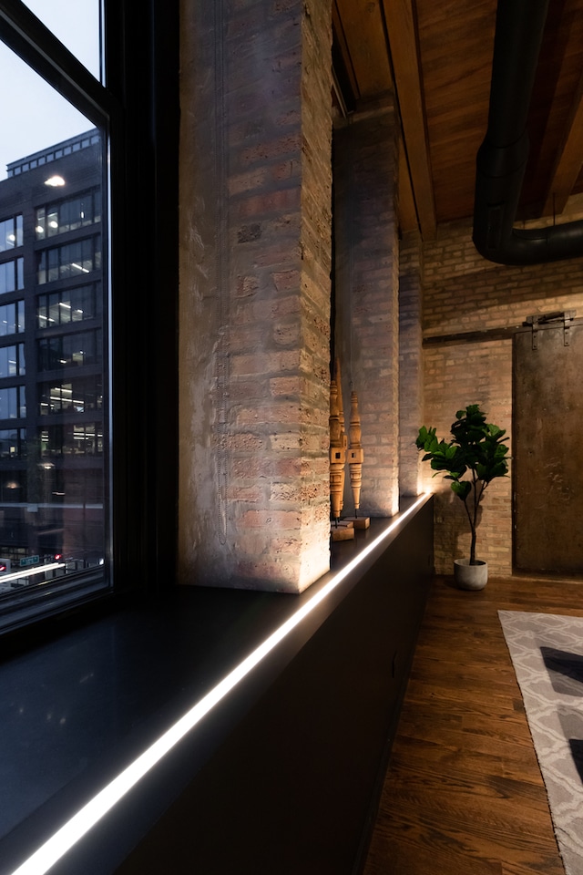 interior details with wooden ceiling and hardwood / wood-style flooring