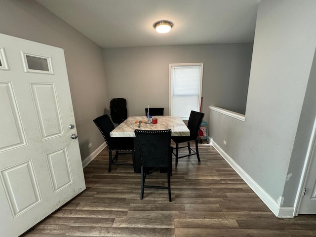 dining room featuring dark hardwood / wood-style flooring