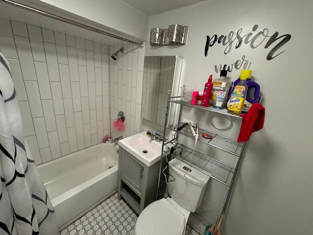 full bathroom featuring shower / tub combo, vanity, and toilet