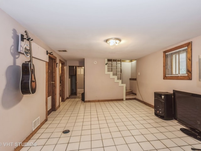 view of tiled spare room