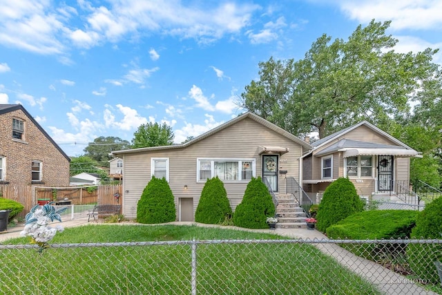 view of front of home featuring a front yard