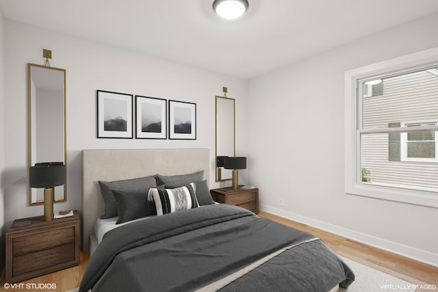 bedroom featuring light hardwood / wood-style floors