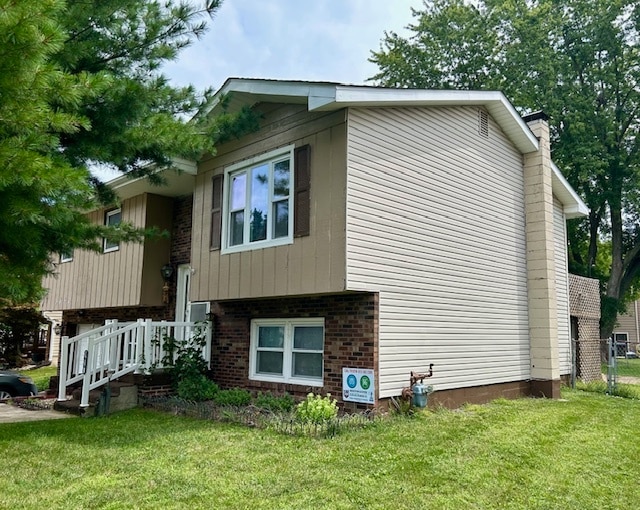 exterior space featuring a front lawn