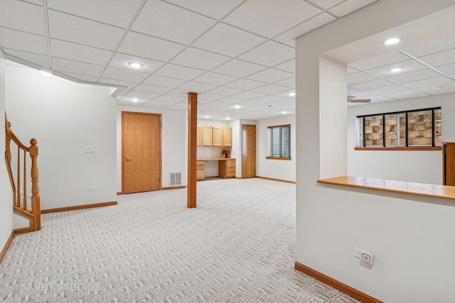 21144 W Buckeye Ct, Plainfield, IL 60544 - below grade area featuring a paneled ceiling, recessed lighting, light colored carpet, and stairway