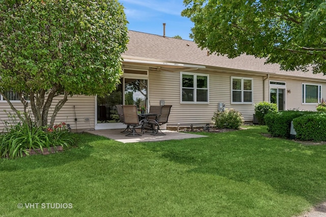 21144 W Buckeye Ct, Plainfield, IL 60544 - rear view of house with a yard, a patio, and roof with shingles