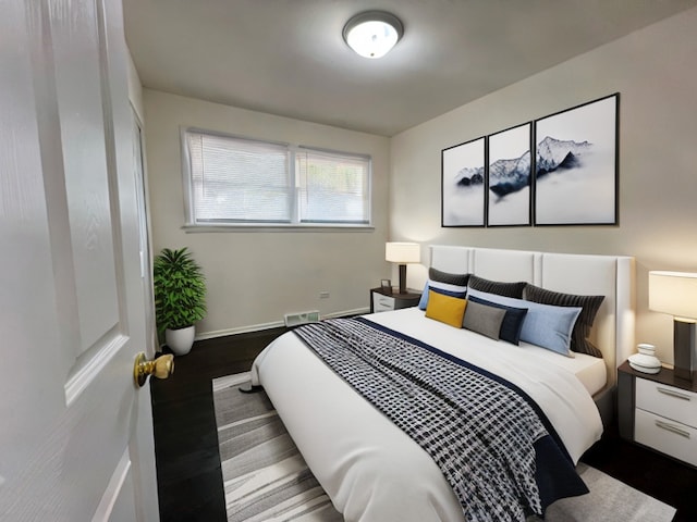 bedroom featuring hardwood / wood-style flooring