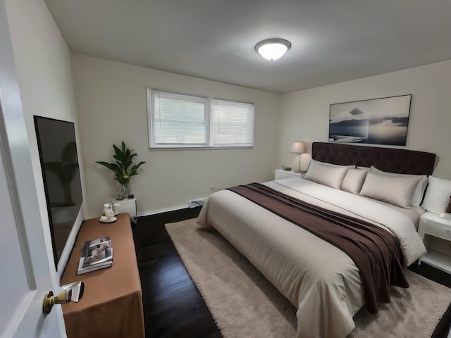 bedroom featuring dark hardwood / wood-style floors