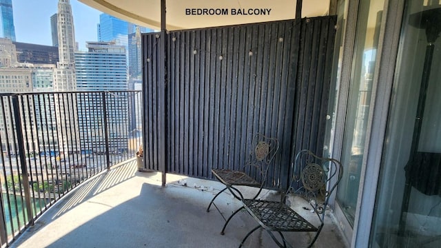 balcony featuring a city view